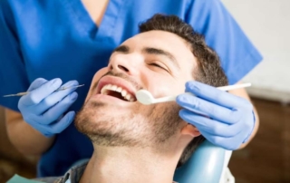 Dentures vs Implants for the Elderly - Making the Right Choice - Monroe Family Dentistry